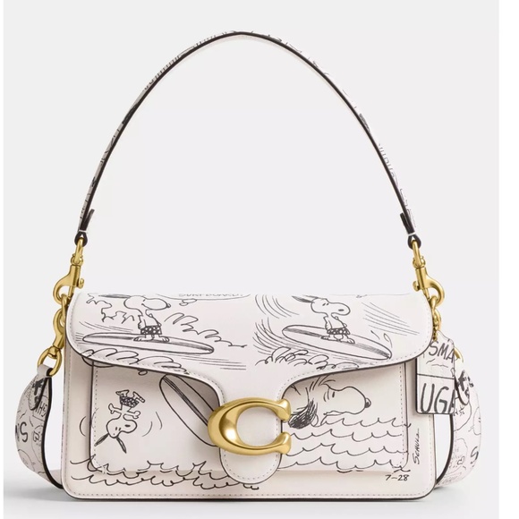 Coach Handbags - Authentic Coach X Peanuts Tabby Shoulder Bag 26 With Newspaper Print